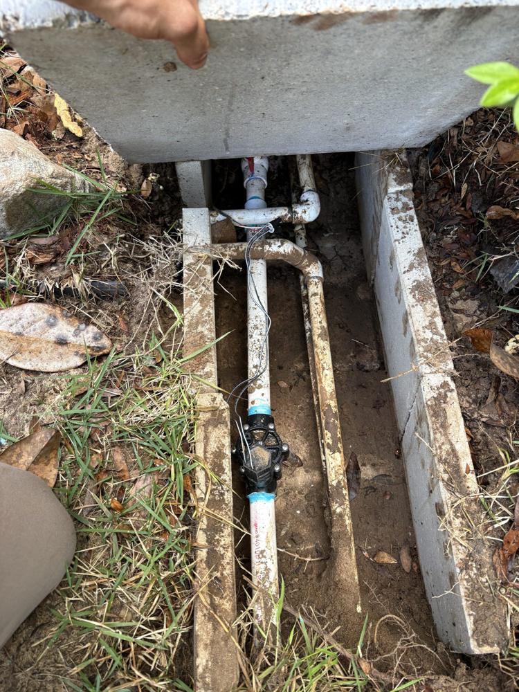 Irrigation backflow assembly in a valve box