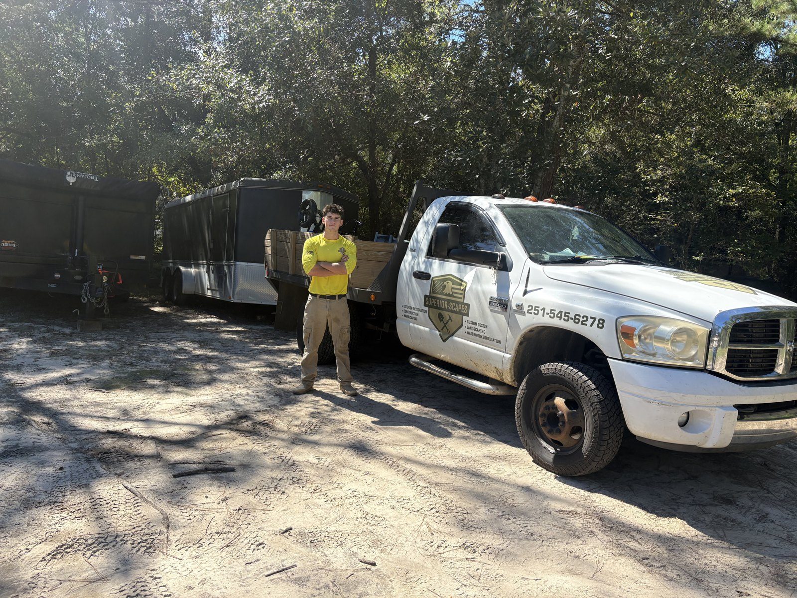 James Scogin with the Superior Scapes truck and trailers