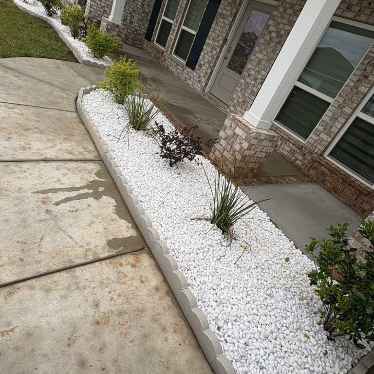 White rock bed along a front walkway